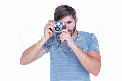 Happy handsome man taking pictures