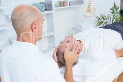 Man receiving head massage