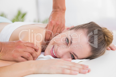 Physiotherapist doing shoulder massage