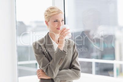 Thoughtful businesswoman looking away Thoughtful businesswoman looking away