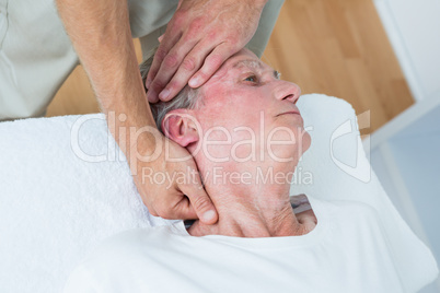 Man receiving neck massage