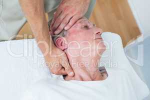 Man receiving neck massage