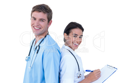 Back to back doctors and nurses  on a white background