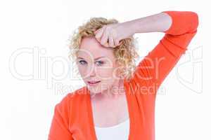 Pretty blonde woman with hand in hair