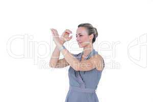 A businesswoman gesturing with hands