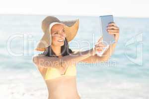 pretty woman taking selfie