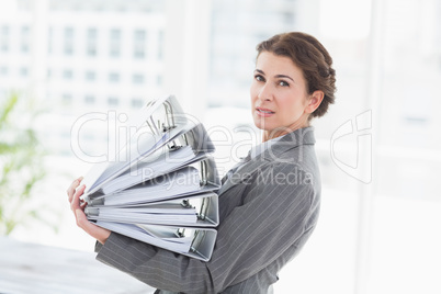 Businesswoman holding files