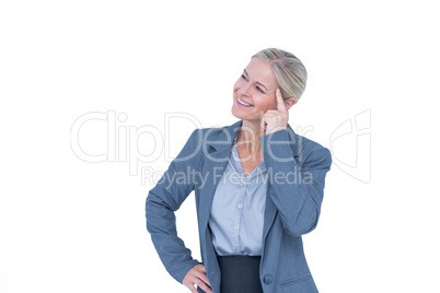 Businesswoman thinking with finger on head