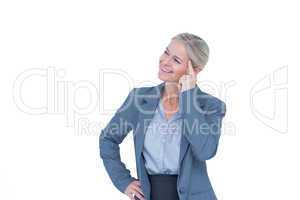 Businesswoman thinking with finger on head