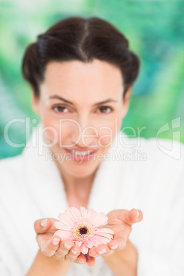 a woman with a flower