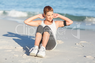 Fit woman doing sit up