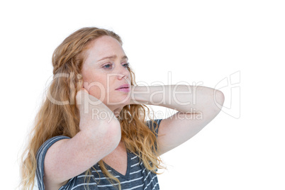 A blonde woman having neck pain