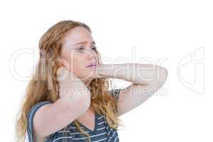 A blonde woman having neck pain
