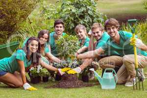 Happy friends gardening for the community