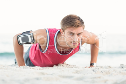 Handsome man doing push ups