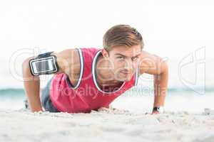 Handsome man doing push ups