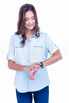 Pretty hipster using her smartwatch
