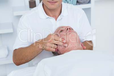 Man receiving head massage