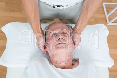 Man receiving neck massage