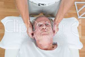 Man receiving neck massage