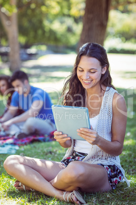 Pretty hipster using her tablet