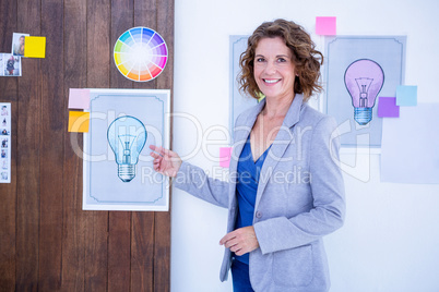 A creative businesswoman pointing poster