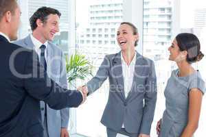 Business colleagues shaking hands