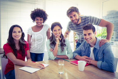 Portrait of a smiling business team looking at the camera