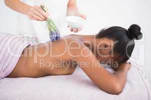 Pretty woman enjoying an aromatherapy massage