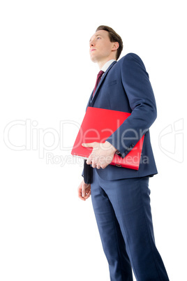 Thoughtful businessman holding red folder