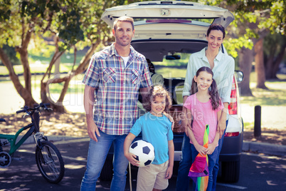 Happy family going for a camping in the park