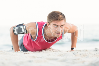 Handsome man doing push ups Handsome man doing push ups