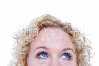 Close up of pretty blonde woman looking up