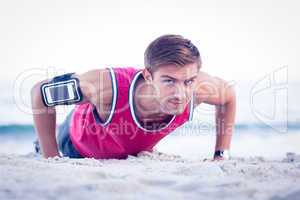 Handsome man doing push ups