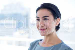 Thoughtful businesswoman looking away