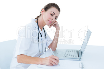 Doctor working on her laptop