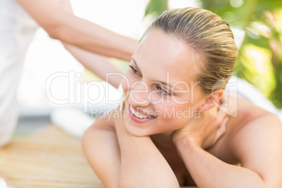 Attractive woman getting massage on her back