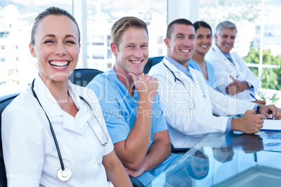 Team of doctors smiling at camera