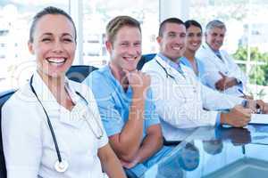 Team of doctors smiling at camera