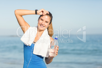 Portrait of beautiful fit woman looking at camera