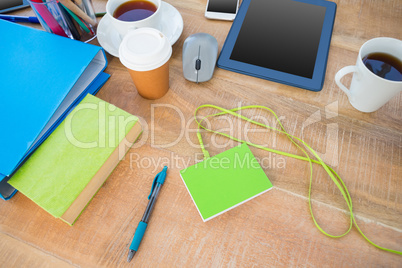 Desk overhead of three workers