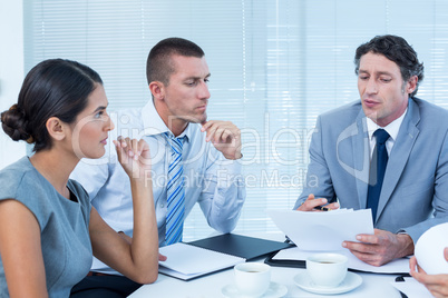Concentrated business team working together