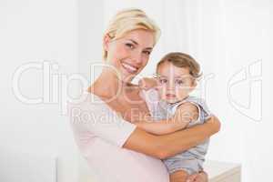 Portrait smiling blonde woman with his son