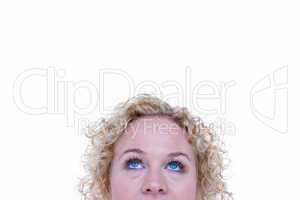 Close up of pretty blonde woman looking up