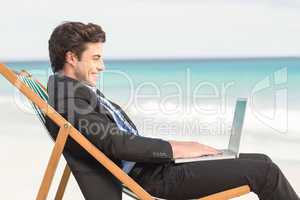 Businessman using his laptop