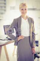 Smiling businesswoman looking at camera