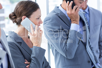 Employees using their mobile phone