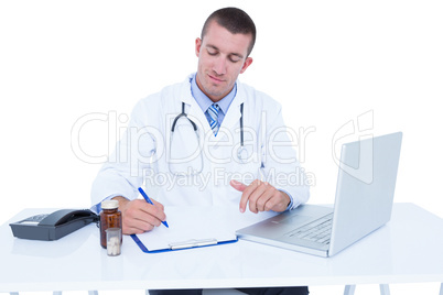 Doctor writing on a notebook