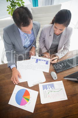 Businesswoman working with team mate