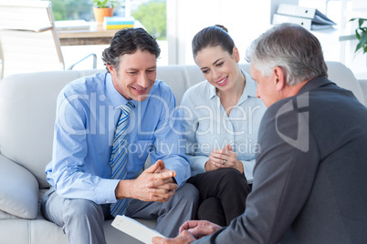 Couple in meeting with a financial adviser